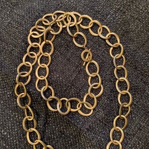 Gold tone chain necklace.
